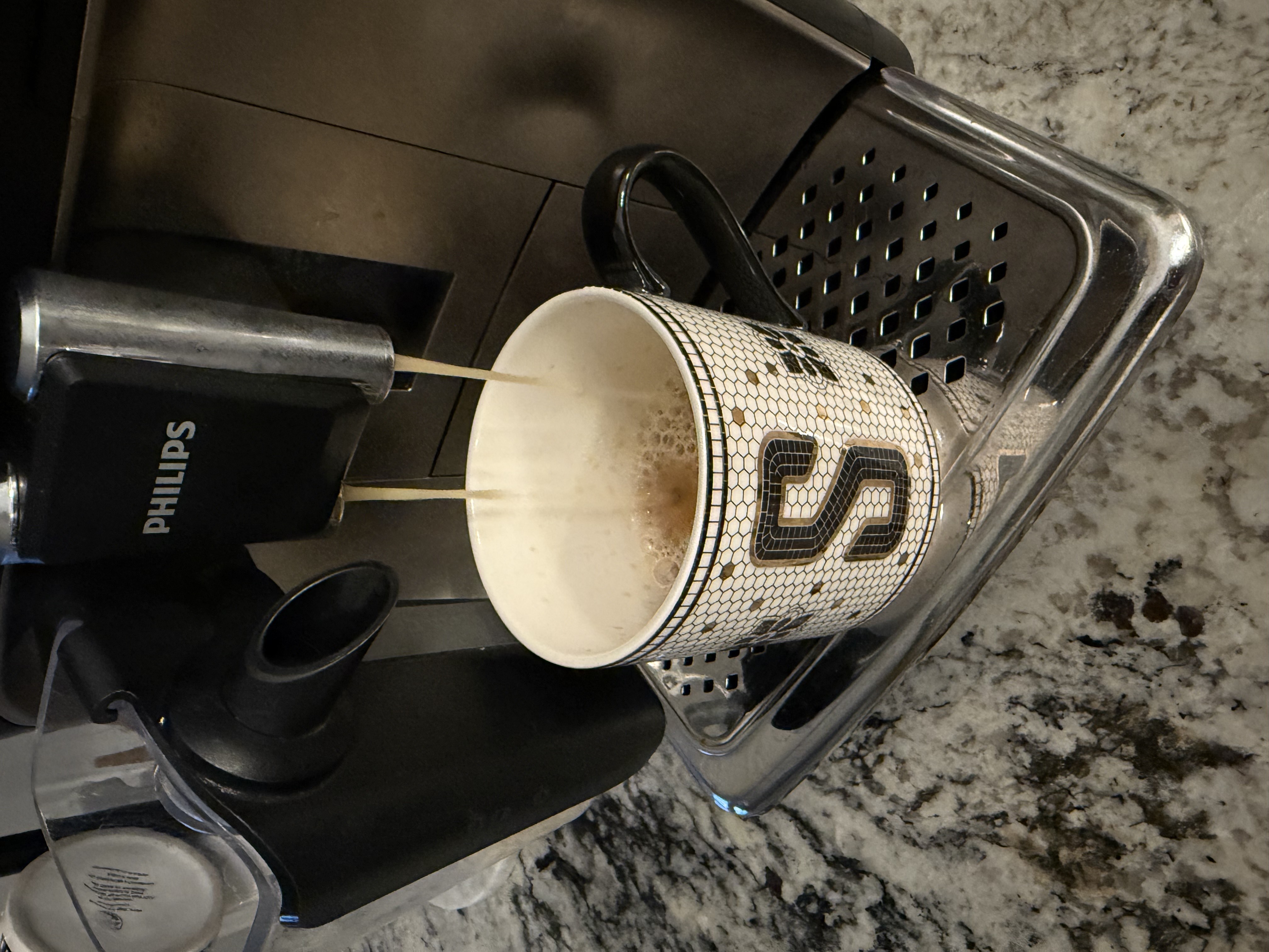 Coffee brewing Sydney Coffee Brewing in an S monogrammed mug